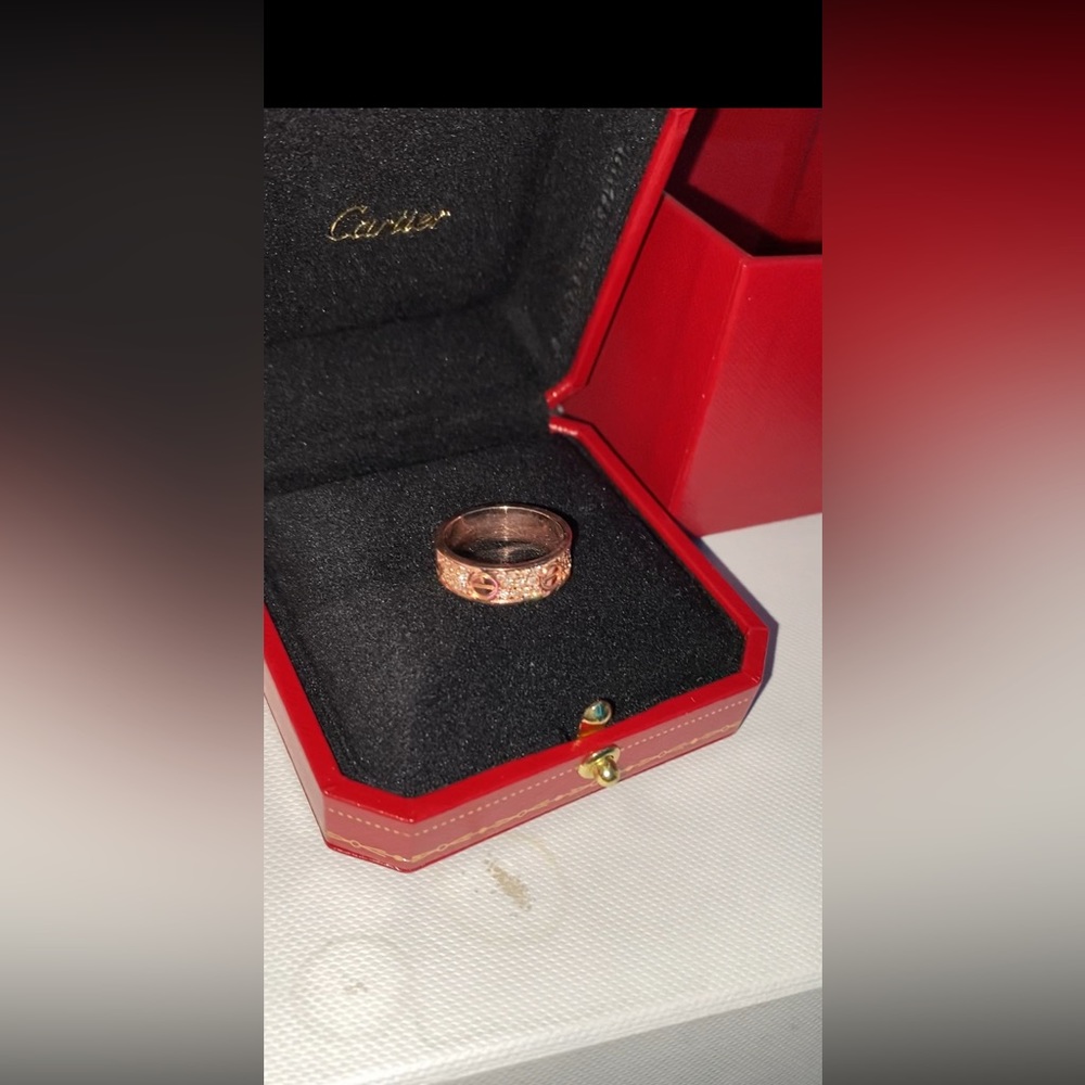 18. Karat rose gold Cartier ring.